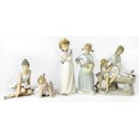 Five Nao figures comprising two ballerinas, two little girls in nightdresses,