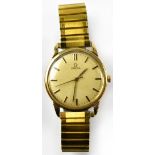 OMEGA; a gentlemen's vintage Genève 9ct gold crown wind wristwatch,