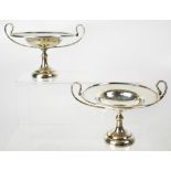 A pair of Edward VII hallmarked silver twin handled pedestal dishes, William Hutton & Sons Ltd,