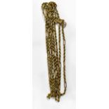 A 9ct gold muff chain with rope twist chain interspersed with long loops, stamped 375,