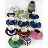 A group of cabinet coffee cups and saucers to include a set of four Crown Staffordshire examples,