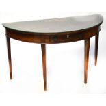A 19th century mahogany demi-lune table with glass top and single frieze drawer with brass drop