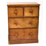 A late 19th/early 20th century mahogany two-over-two chest of drawers of small proportions,