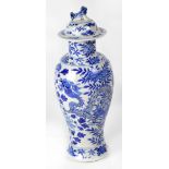 A 19th century Chinese blue and white baluster vase with cover,