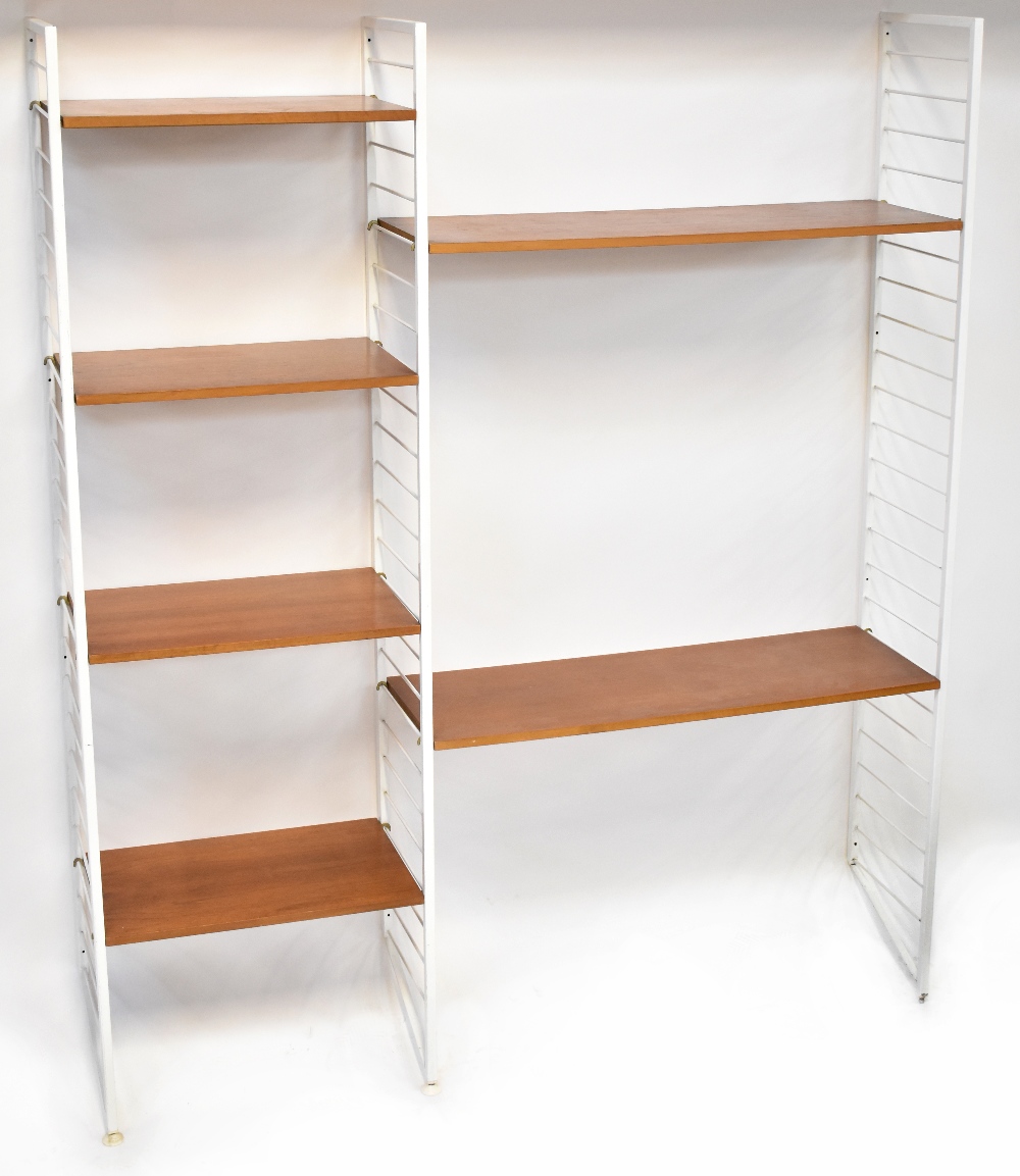 A Ladderax shelving unit in white with two long and four short wooden shelves, 201 x 170 x 36cm.