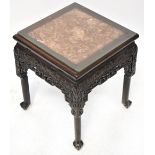 An Oriental hardwood marble topped jardinière stand with rounded square rouge marble inset panel to