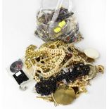 A mixed lot of costume jewellery to include brooches, necklaces, earrings, fashion watch, etc.