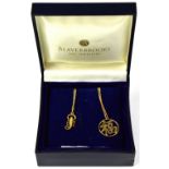 A 14ct gold pendant in the form of a Chinese symbol, stamped 585, on a 9ct gold fine chain necklace,