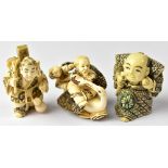 Three Japanese netsuke comprising a man and child riding a stork,