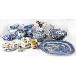 Various 19th century and later blue and white ceramics to include a large Willow pattern meat dish