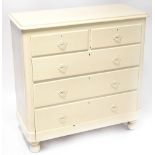 A cream painted Victorian mahogany two-over-three chest of drawers, to large ball feet,