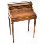 A reproduction bonheur de jour writing desk with galleried top above three short drawers,