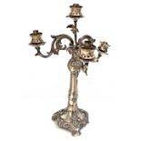 A silver plated four-branch candelabra with three scrolling branches and central branch for sconces,