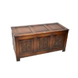 A reproduction oak coffer,