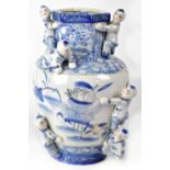 A modern Chinese blue, white and gilt heightened baluster vase with hexagonal rim,