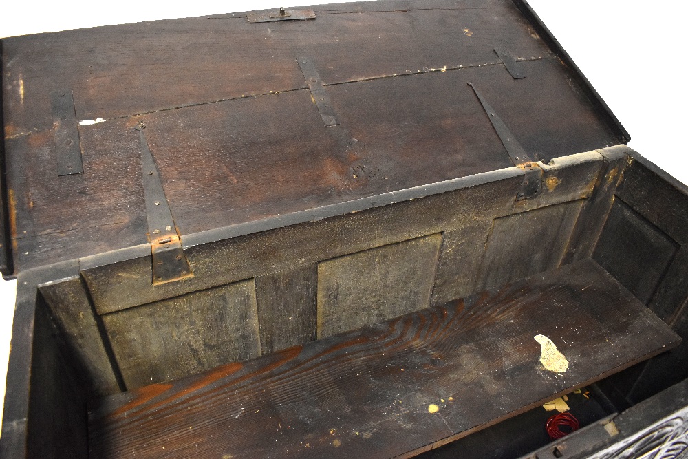 An 18th century oak mule chest with plank top above carved front, - Image 2 of 3