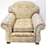 A 19th century Howard-style armchair, recently re-upholstered in period style,