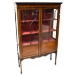 An Edwardian inlaid walnut two-door display cabinet,