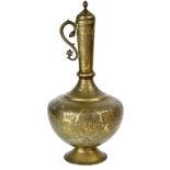 A late 19th early 20th century brass baluster vase with cover and stylised serpent handle,