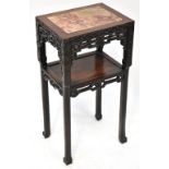An Oriental hardwood marble topped jardinière stand with rounded rectangular rouge marble inset