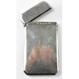 A George V hallmarked silver card case,