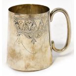 An Edwardian hallmarked silver Christening mug of tapered form,