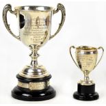 A George V hallmarked silver twin handle trophy,