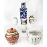 A group of six Oriental ceramics to include a large blue and white floral decorated vase,