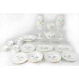 A Wedgwood 'Ice Rose' part tea and dinner service comprising teapot, cups and saucers, coffee cup,