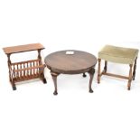 An early 20th century circular mahogany coffee table raised on cabriole legs to pad feet,