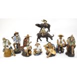 A group of nine assorted modern Chinese mud men figures to include fishermen,