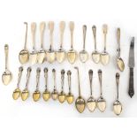 Various hallmarked silver and white metal tea spoons, coffee spoons and a silver handled cake knife,