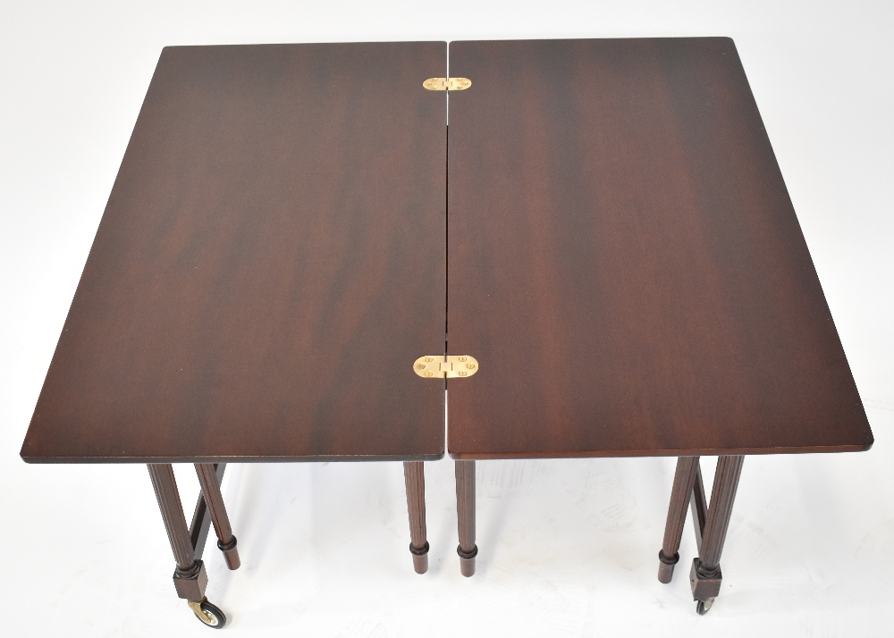 A modern mahogany fold-over tea table trolley containing two smaller square section occasional - Image 4 of 4