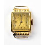 A ladies' vintage 18ct gold wristwatch head with convex crystal, the square dial in gold finish,