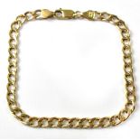 A 9ct gold flat curb link bracelet united with lobster claw clasp, length 19cm, approx 3g.