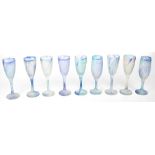 A set of nine Turkish opaque wine glasses with rainbow stria, height of each 19cm (9).