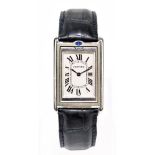 CARTIER; a stainless steel Cartier Tank Basculante wristwatch circa 1990 with white face and