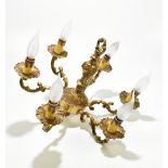 A French gilt metal six branch ceiling light in the Rococo style, height 33cm.