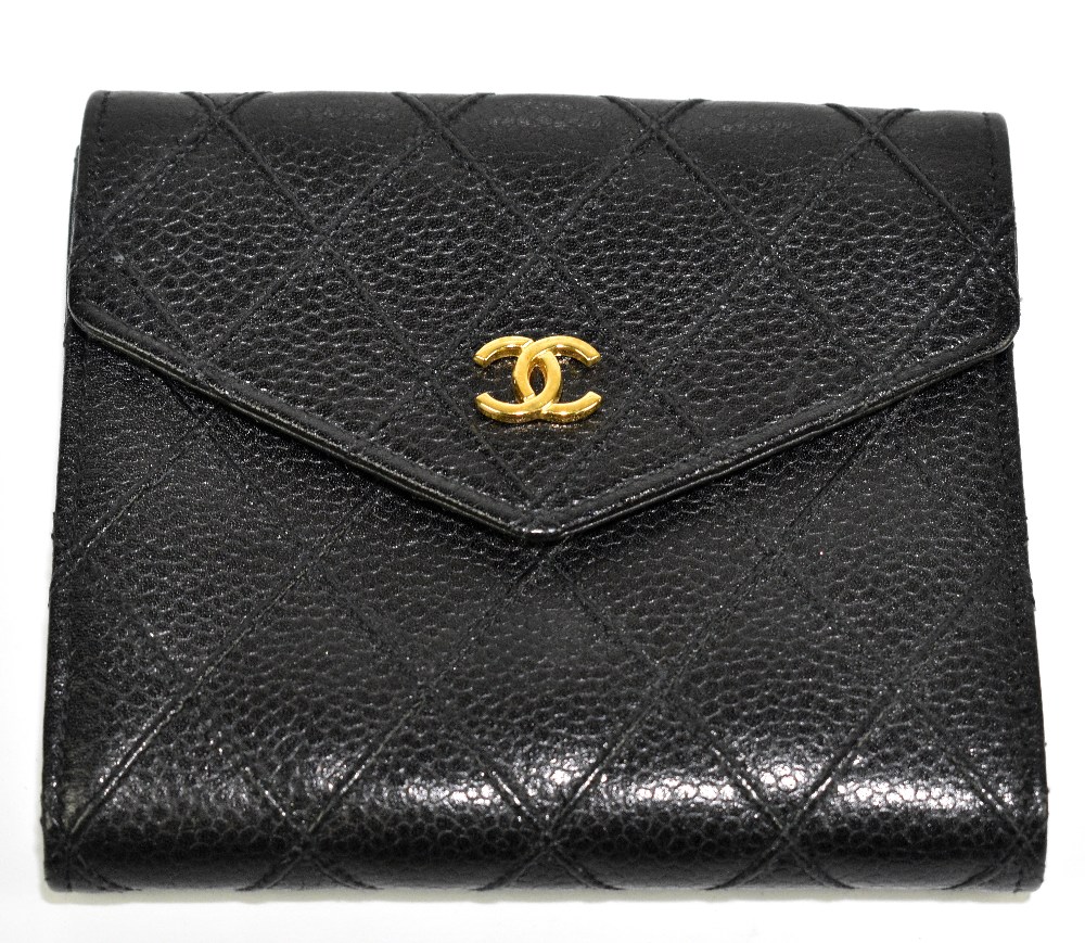 CHANEL; a black Matresse leather purse/wallet with a snap button side for coins, with gold tone