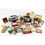 A quantity of costume jewellery including simulated pearls, brooches, stick pin, etc.