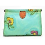 BEBA DE SIMONE; a green covered leather clutch bag/wash bag with floral design, trimmed with tan