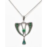 CHARLES HORNER; an Edwardian hallmarked silver and green enamelled Art Nouveau pendant of pierced