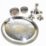 A small collection of assorted silver plate including a pair of squat candlesticks, two wine