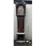 MAPLE & Co OF LONDON; a mahogany longcase clock with arched brass dial, three train movement