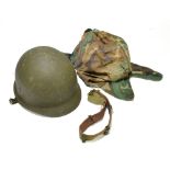 An American army helmet with camouflage cover, length 28cm.