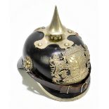 A German or Prussian WWI pickelhaube with applied plaque inscribed ‘Bayern’ with twin lion mask ring