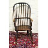 A 19th century beech and ash country kitchen Windsor chair, with spindle back and saddle seat, on