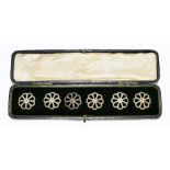 CHARLES HORNER; a cased set of six late Victorian hallmarked silver buttons each with pierced flower