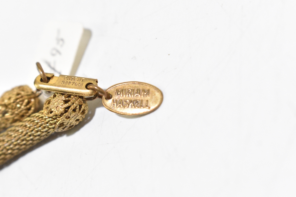 MIRIAM HASKALL; a gold tone vintage rope necklace with tag stating 'Miriam Haskall Patent - Image 3 of 3