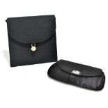 JIM THOMPSON; a black structured patterned cloth evening bag embellished with gold tone and